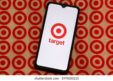 Bahia, Brazil - May 15, 2021: Target Store Logo On Smartphone Screen On Top Of Target Shopping Bag. Hypermarket.