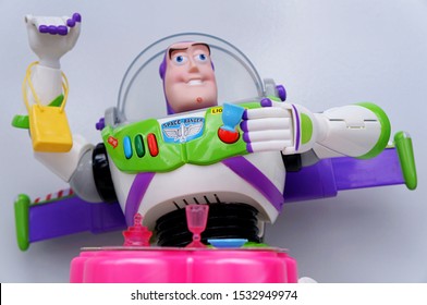 Bahia, Brazil - October 16, 2019. Buzz Lightyear Drinking Coffee. Toy Story Character. Editorial Use Only. 