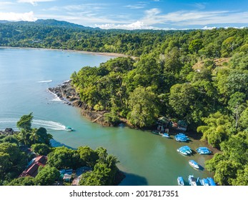 Bahia Drake, Peninsula de Osa, Puntarenas, Costa Rica - Aerial Drone Shot of famous Drake Bay near Corcovado National Park at river mouth with boat dock of Aguila de Osa Rainforest Eco Lodge