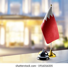 Bahrain Flag On The Reception Desk In The Lobby Of The Hotel