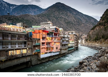 Bahrain is located at an elevation of 4700 ft on the right bank of the Swat river, Pakistan.