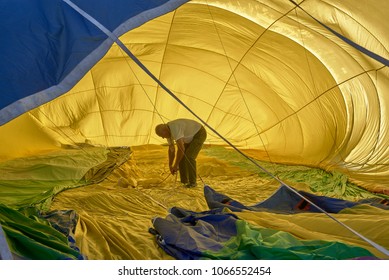 Baia Mare, Maramures, Romania, 30.09.2017. Balloon Festival At Baia Mare Airport. A Man Inside A Hot Air Baloon Prepares The Flight Ballon.