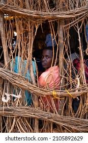 Baidoa, Somalia May 15,2019: Man Looking Out Of Bush House In Refugee Camp