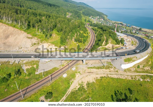 The Baikal serpentine road - aerial view of\
natural mountain valley with serpantine road, Trans-Siberian\
Highway, Russia, Kultuk,\
Slyudyanka