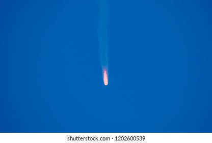 Baikonur, Kazakhstan - October 11, 2018: Real Rocket in Flight, Launch Rocket From the Baikonur Cosmodrome, a Flying Rocket in the Sky. Rocket launcher crash explosion and fall spaceship the Soyuz