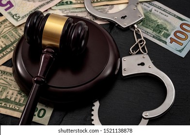 Bail Bond System, Bailing Out Of Jail And Innocent Until Proven Guilty Conceptual Idea With Judge Wooden Gavel, Dollar Banknotes And Handcuffs