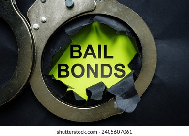 Bail bonds inscription and handcuffs.