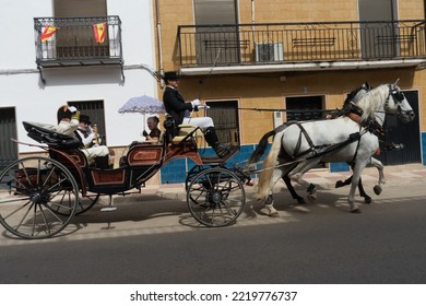 Bailen, Jaén, Spain; 11-9-2022: Recreation Of The Battle Of Bailen, High Society Characters Dressed In The Napoleonic Era Riding In A Carriage