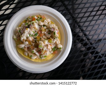 Baja Mexico Refreshing Shrimp Ceviche Tostada On A White Plate