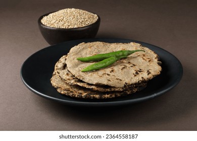 bajra with bajra roti and green chillies 