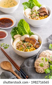 Bak chor mee. The noodles are tossed in vinegar, minced meat, pork slices, pork liver, stewed sliced mushrooms, meat balls and bits of deep-fried lard