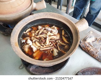 Bak kut teh or Bakut is a pork rib dish cooked in broth, served in Malaysia Singapore and Thailand. Bak kut teh and tea pot. Bak kut teh with dough fritters. stew of pork, and herbal soup, ba kut teh