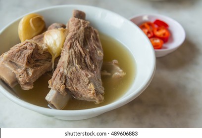 Bak Kut Teh in the white bowl on the table