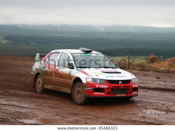 BAKAL, RUSSIA - AUGUST 8: Lancer Evolution VII\
(No. 2) competes at the Annual Rally Southern Ural, Andrey\
Zhigunov\'s Mitsubishi on August 8, 2009 in Bakal, Satka district,\
Chelyabinsk region,\
Russia.