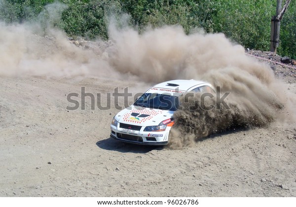 BAKAL, RUSSIA - JULY 9: Andrey Trukhin\'s\
Mitsubishi Lancer Evolution VII (No. 2) competes at the annual\
Rally Southern Ural on July 9, 2011 in Bakal, Satka district,\
Chelyabinsk region,\
Russia.