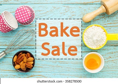 Bake Sale Background With Baking Ingredients On Wood Table