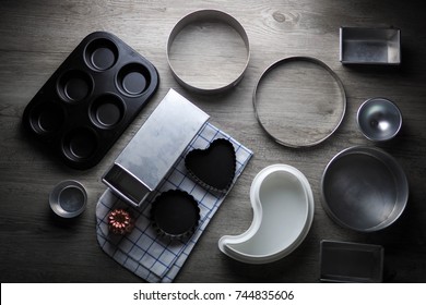 Bake ware (bakery tools) on wood table. 