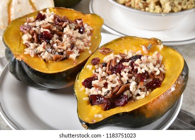 Baked Acorn Squash Stuffed With Wild Rice, Quinoa, Dried Cranberry And Pecans.