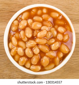 Baked Beans - Bowl Of Baked Beans In Tomato Sauce. Shot From Above.