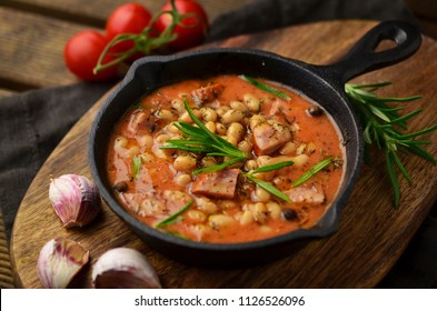 Baked beans on frying pan - Shutterstock ID 1126526096