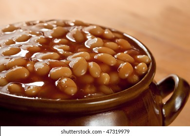 Baked Beans In Tomato Sauce, In A Brown Pot.