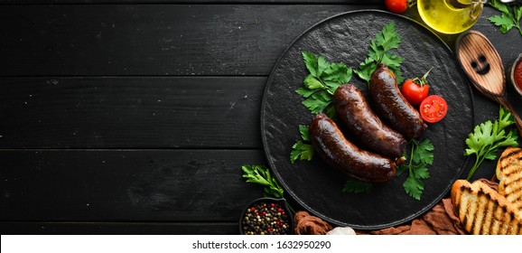 Baked blood sausage. Buckwheat sausage. Top view. Free space for your text.