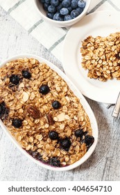 Baked Blueberry Oatmeal - Healthy Breakfast With Oats Nuts And Blueberries, Selective Focus