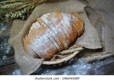 baked bread on wooden table background - Shutterstock ID 1486965689