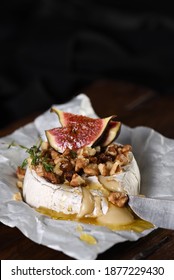 Baked Camembert With Nuts And Honey, Fig And Thyme Slices.