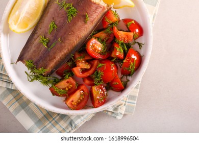 Baked Catfish With Salad Served On Plate