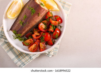 Baked Catfish With Salad Served On Plate