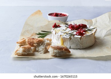 Baked Cheese Brie With Rosemary And Cranberry Sauce