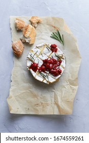 Baked Cheese Brie With Rosemary And Cranberry Sauce