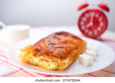 Baked cheese pie with milk. Bulgarian butter banitsa for breakfast