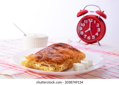 Baked cheese pie with milk. Bulgarian butter banitsa for breakfast