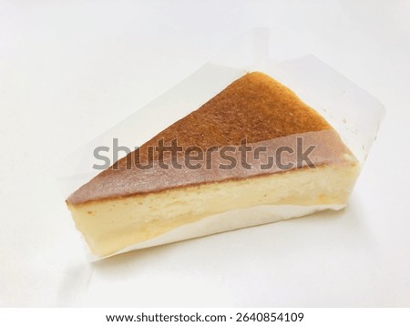 Baked cheesecake cut into individual portions