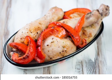 Baked Chicken Legs With Grilled Bell Pepper Slices, Studio Shot