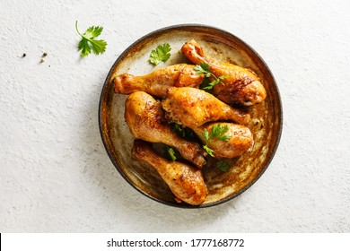 Baked Chicken Legs With Spices And Fresh Herbs. Top View.