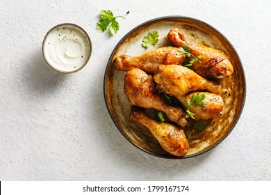 Baked Chicken Legs With Spices And Fresh Herbs. Top View.