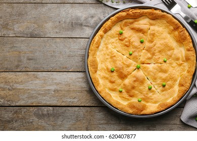 Baked Chicken Pot Pie On Wooden Table