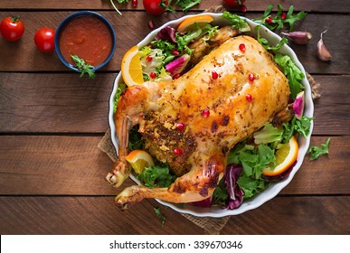 Baked Chicken Stuffed With Rice For Christmas Dinner On A Festive Table. Top View