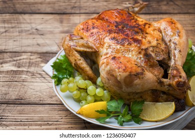 Baked chicken with stuffing for dinner on the holiday table copy space