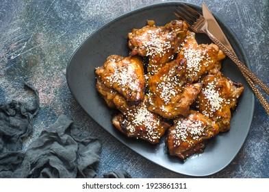 Baked chicken wings in honey and soy sauce glaze  