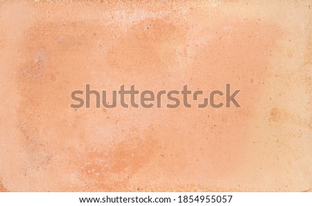 Baked clay similar to cement or terracotta texture background. Natural coatings of clay mortars.Rustic wall.