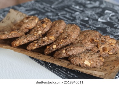 Baked cookies on a plate. Healthy cookies with peanuts and chocolate. - Powered by Shutterstock