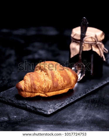 Similar – baked croissants with strawberry jam