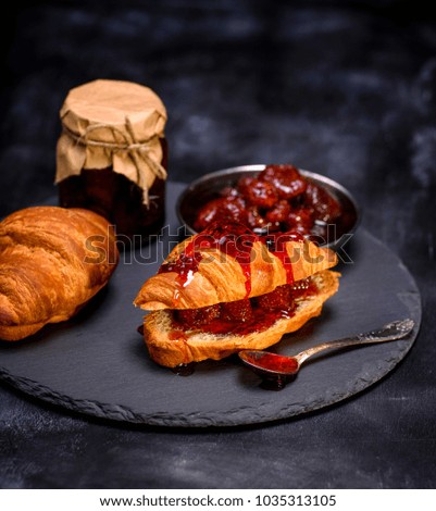 Similar – baked croissants with strawberry jam