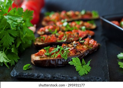 Baked eggplant with tomatoes, garlic and paprika