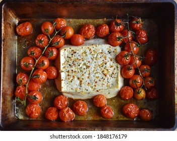 Baked feta pasta, or Tiktok pasta. Feta cheese and tomatoes in chilli and garlic oil. Use chili! In the oven it turns into an amazing pasta sauce by itself. Just add some cooked pasta, mix and enjoy.