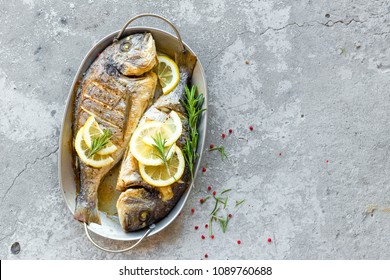 Baked fish dorado. Sea bream or dorada fish grilled